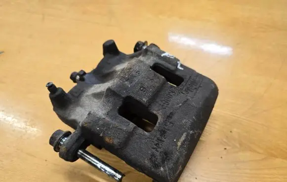 Mazda CX-7 Front brake caliper K0089
