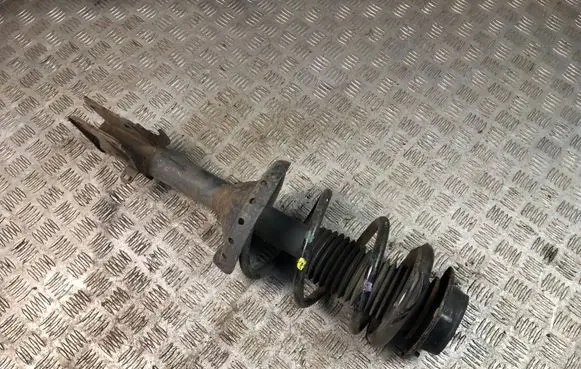 Subaru Outback Front shock absorber with coil spring
