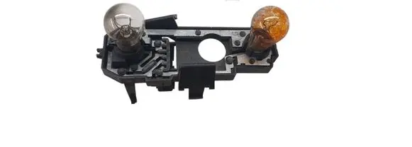 Tail light bulb cover holder