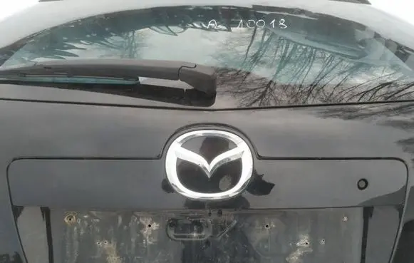 Mazda CX-7 Trunk door license plate light bar 