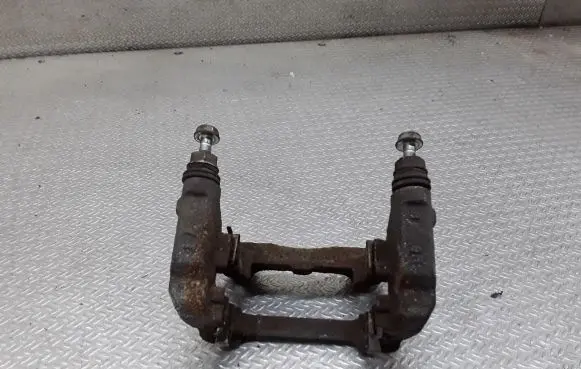 Toyota RAV 4 (XA50) Brake caliper pad carrier rear 