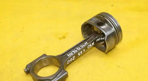 Piston with connecting rod