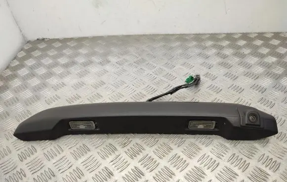 Trunk door license plate light bar