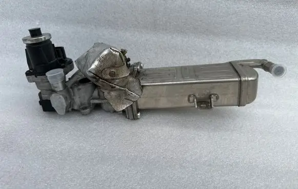 Volkswagen PASSAT B7 EGR valve cooler 2090687 02A40568