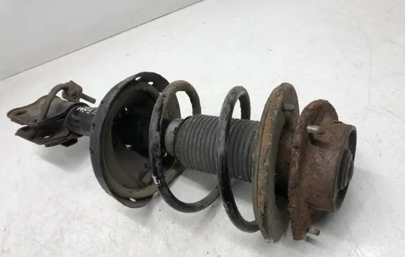 Subaru Impreza III Front shock absorber with coil spring 339226 KYB339226