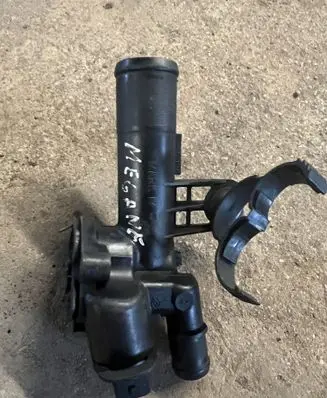 Thermostat/thermostat housing