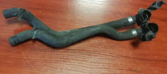 Mercedes-Benz E W210 Engine coolant pipe/hose 2108300024