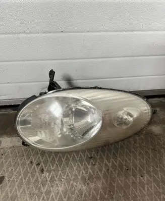 Nissan Micra Headlight/headlamp 26010AX700 AX700 89008335