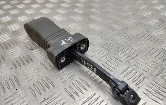 Rear door check strap stopper