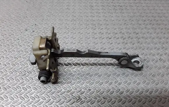 Front door check strap stopper