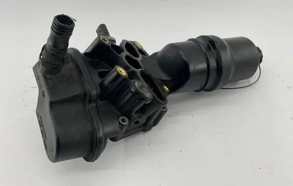 Audi TT TTS Mk2 Oil filter mounting bracket 06F115397H