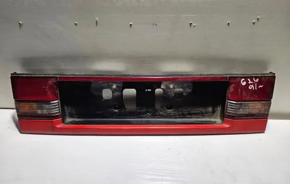 Mazda 626 Rear light center trim bar blend 0167853 0167835R