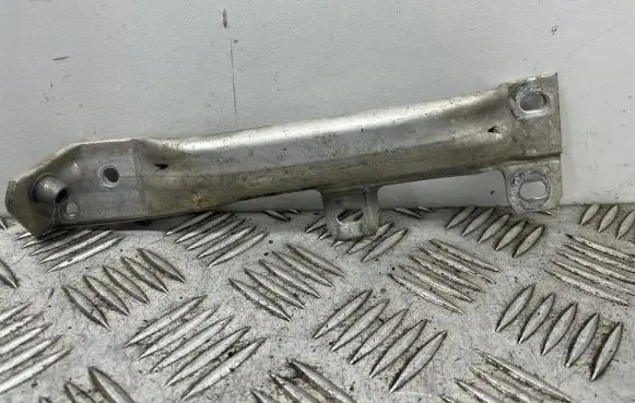 Radiator support slam panel bracket