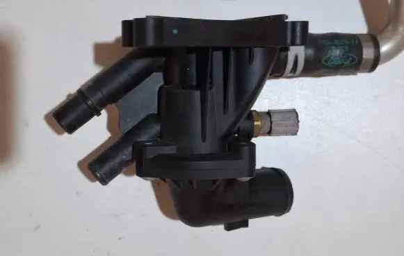 Thermostat/thermostat housing