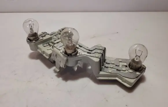Volvo V50 Tail light bulb cover holder