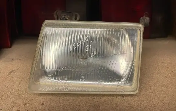 Ford Escort Headlight/headlamp 77FG13K060CA