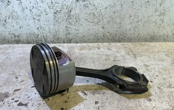 Piston with connecting rod