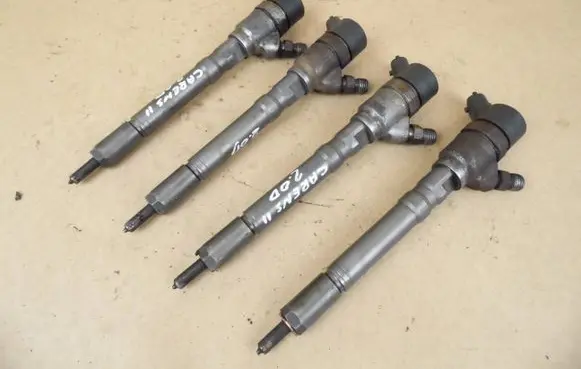 KIA Carens II Fuel injector 0445110064 338002700