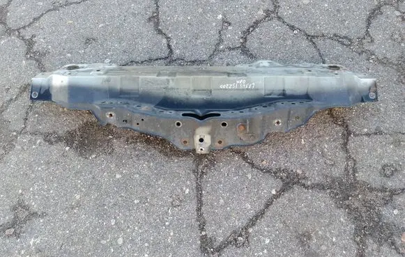 Top upper radiator support slam panel