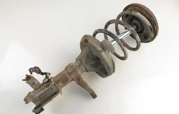 Honda FR-V Front shock absorber with coil spring 