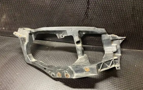 Mitsubishi Colt Headlight/headlamp mounting bracket MN105060