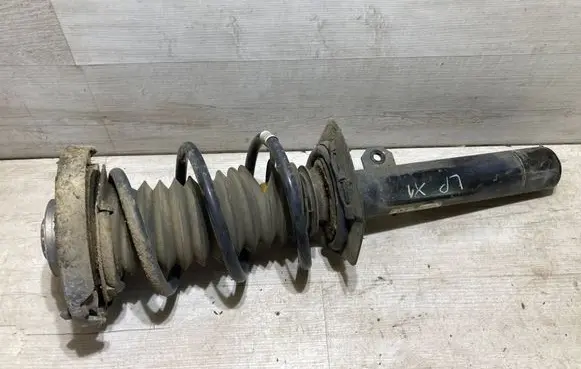 Front shock absorber with coil spring