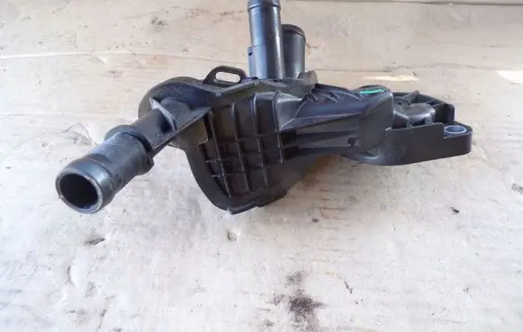 Thermostat/thermostat housing