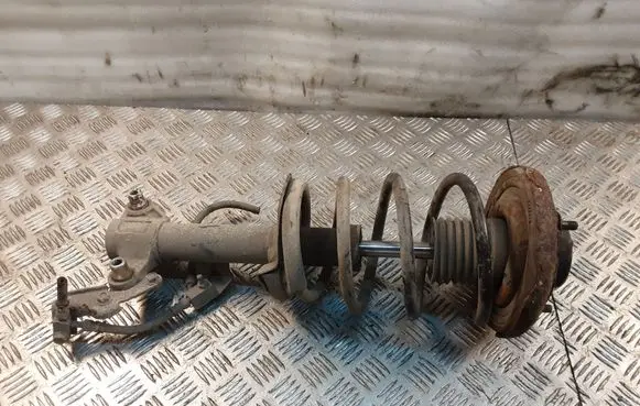 Nissan Primera Front shock absorber with coil spring