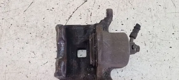 Nissan Juke I F15 Front brake caliper