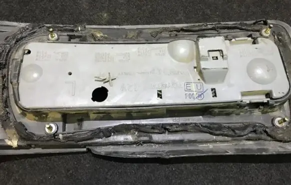 Toyota Celica T160 Tail light bulb cover holder