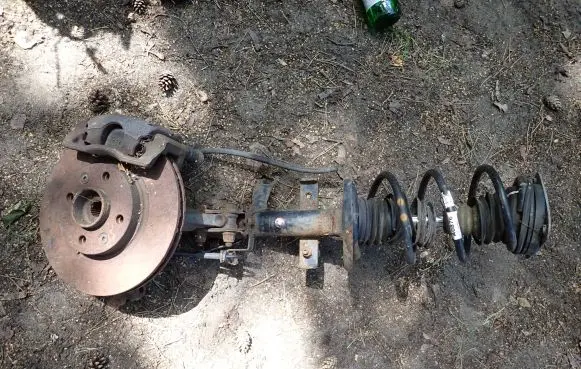 Renault Clio IV Front shock absorber with coil spring