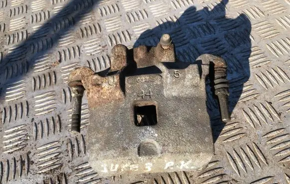 Nissan Juke I F15 Front brake caliper