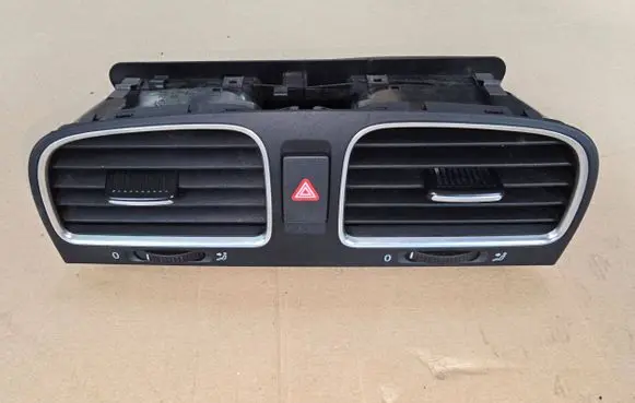 Volkswagen Golf VI Dash center air vent grill 5K0819728