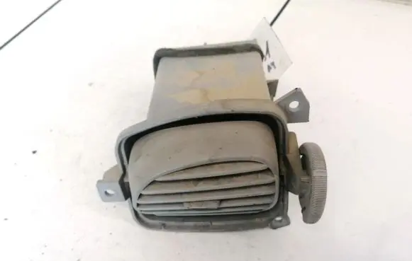 Nissan Almera Tino Dash center air vent grill 68760BU200 68760BU201