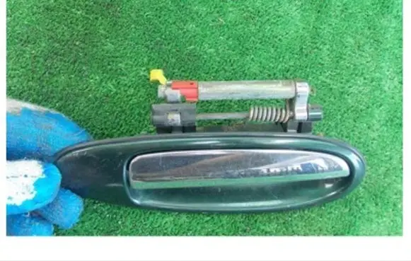 Nissan Maxima Rear door exterior handle