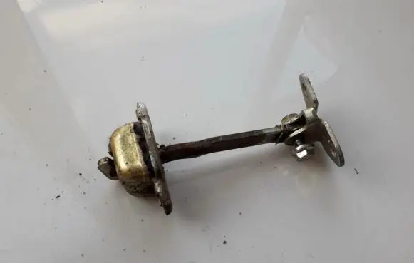 Volkswagen Golf III Front door check strap stopper 