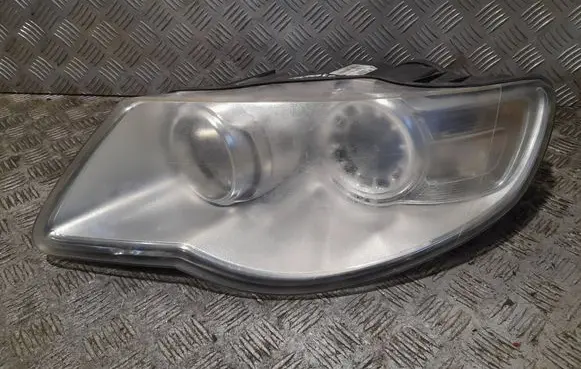 Volkswagen Touareg I Headlight/headlamp 7L6941031A 24703203000036