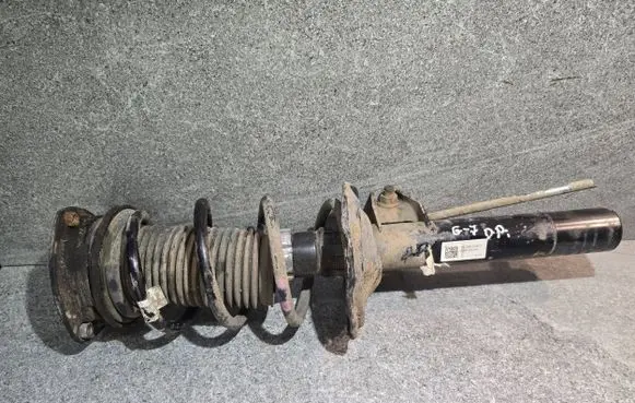 Volkswagen Golf VII Front shock absorber/damper 5Q0413023FM