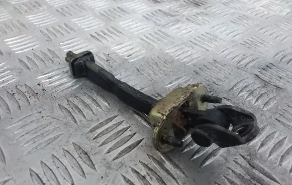 Ford Focus Front door check strap stopper