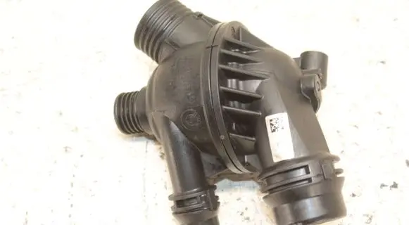 Thermostat/thermostat housing