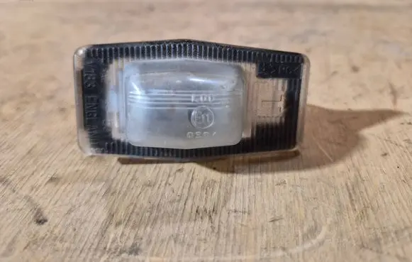 Mazda 323 Number plate light E110384 V183