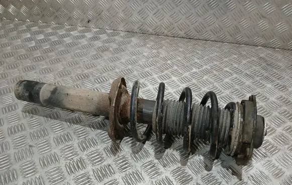 Volkswagen PASSAT B7 Front shock absorber with coil spring