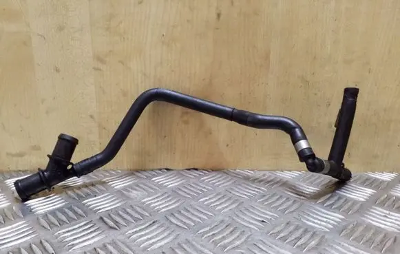 Volkswagen Touareg II Engine coolant pipe/hose 7P5121058