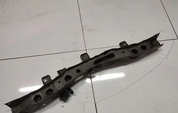 Radiator support slam panel