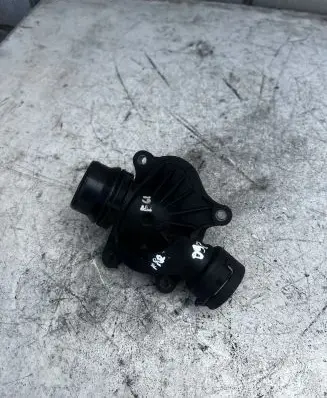 Thermostat/thermostat housing
