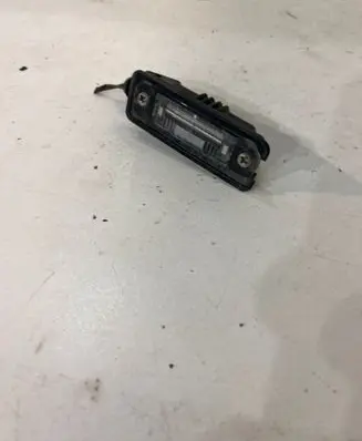 Volkswagen Golf V Number plate light 1J6943021B
