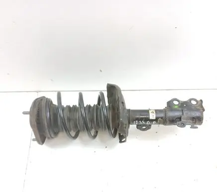 Toyota Corolla E210 E21 Front shock absorber with coil spring