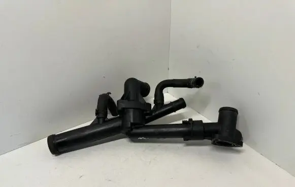 Volkswagen Touareg II Engine coolant pipe/hose 03H121026D