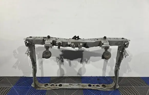 Radiator support slam panel