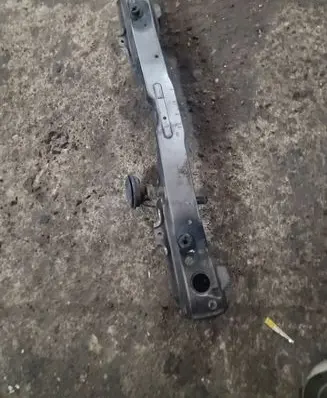 Top upper radiator support slam panel